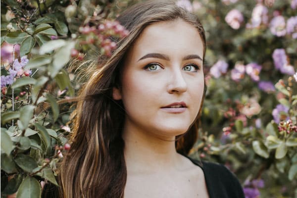 spring flowers on the background of a young woman