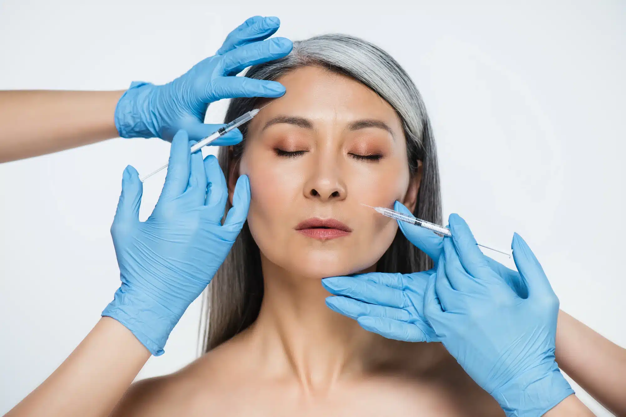 asian woman getting korean dermal fillers injections