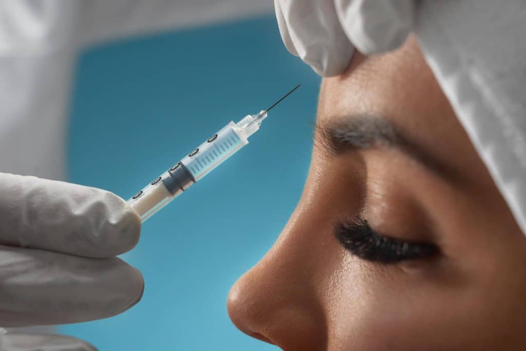 Neuromodulator injection targeting wrinkles in the forehead.