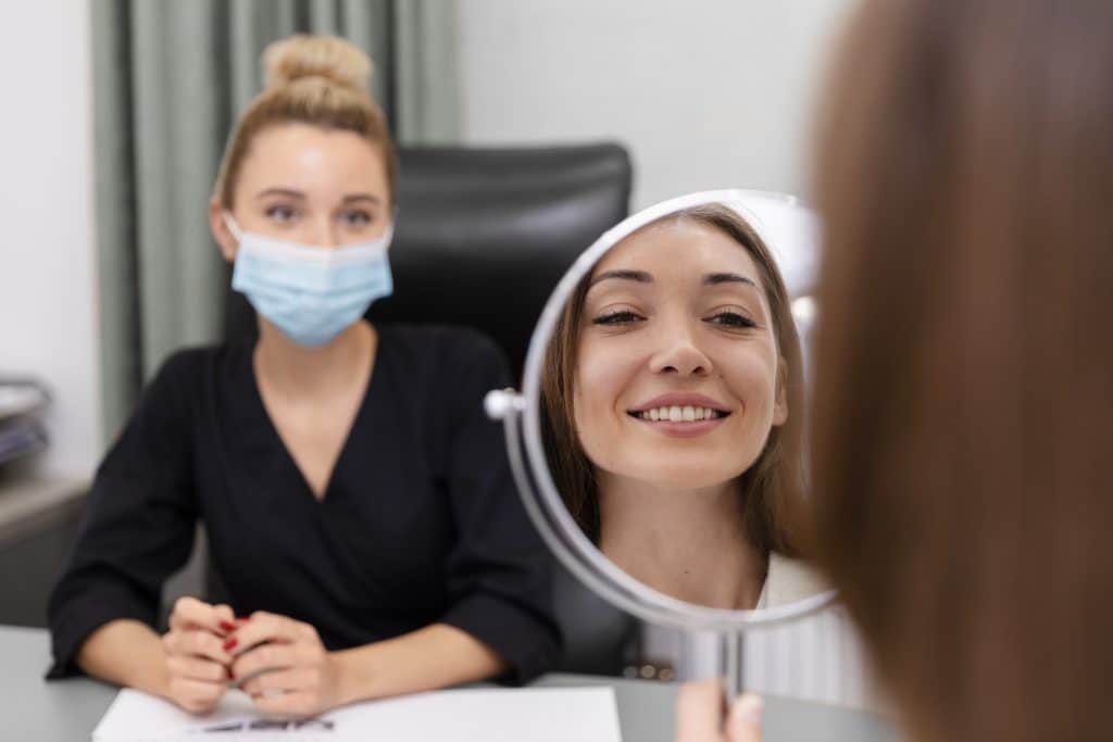 close up happy patient dentist