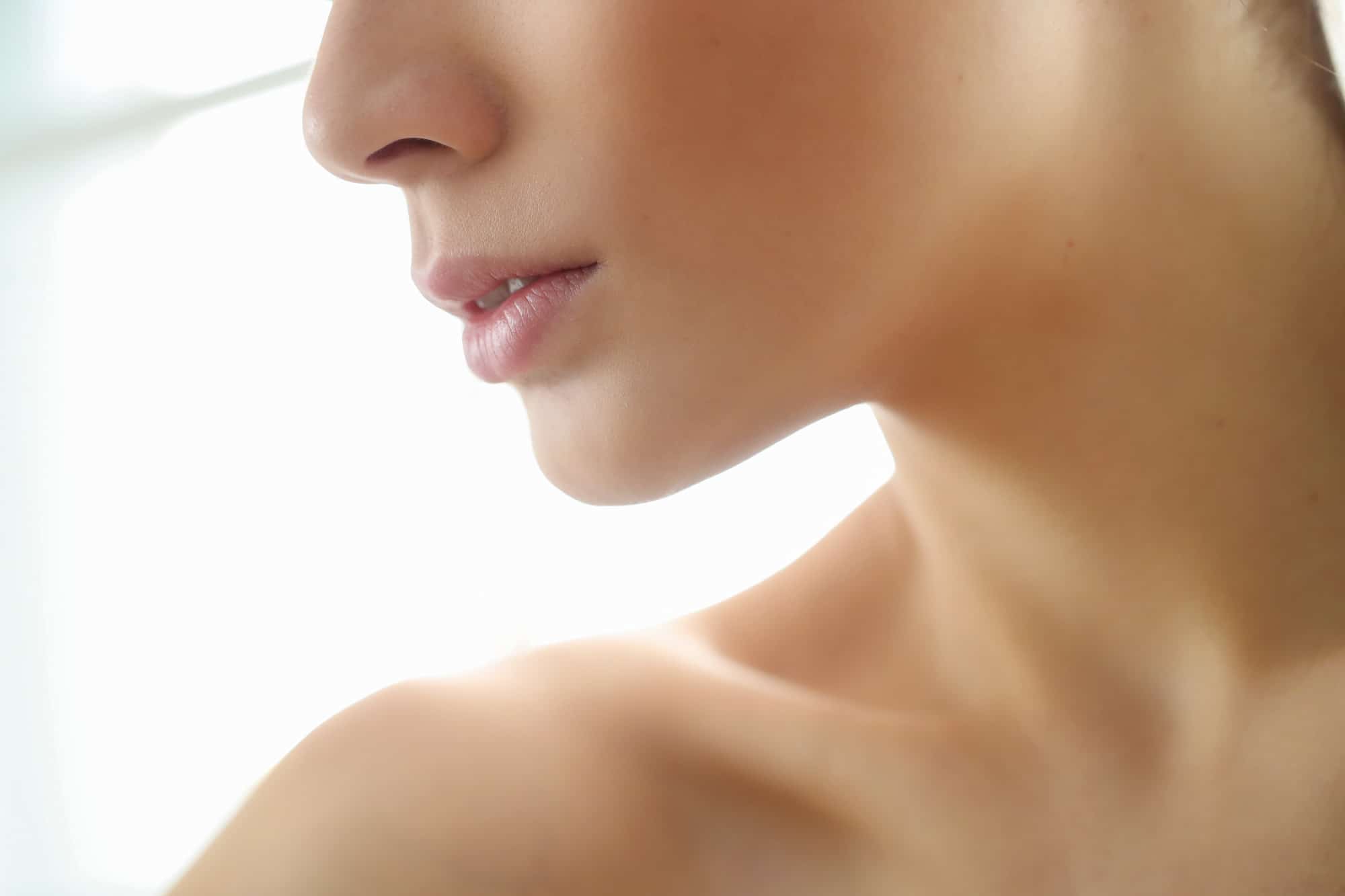 Defined and contoured jawline after getting Dysport treatment.