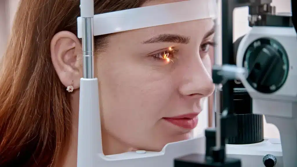 woman gets a check up with an opthalmologist