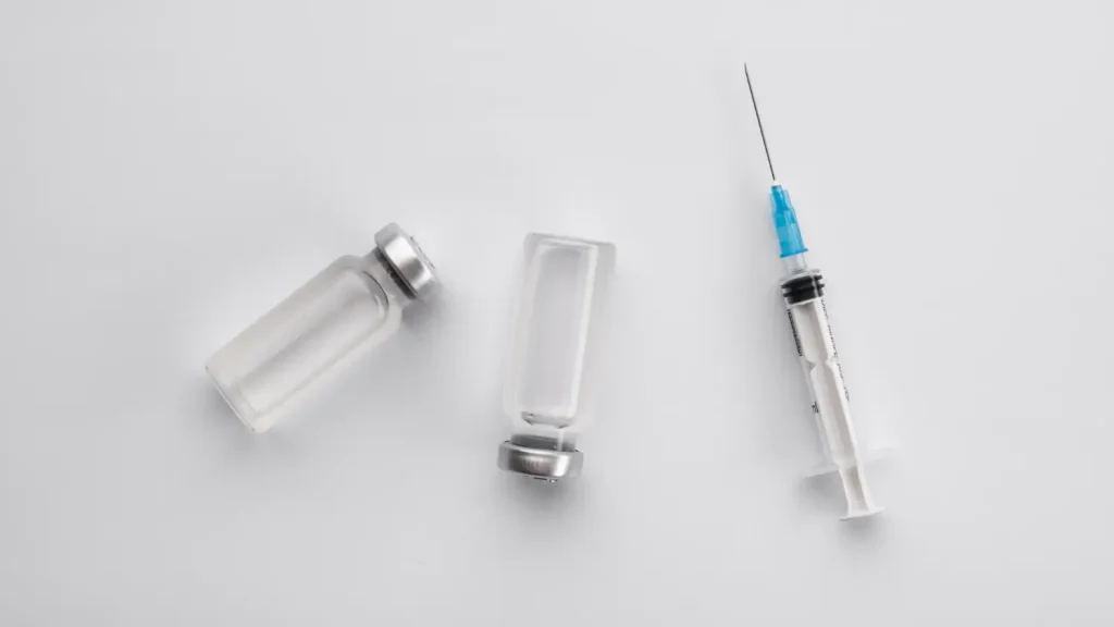 showing the syringe and vials to be used