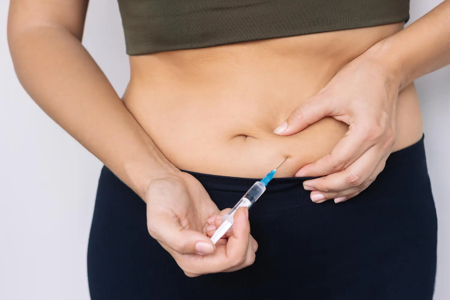 injecting one's abdomen