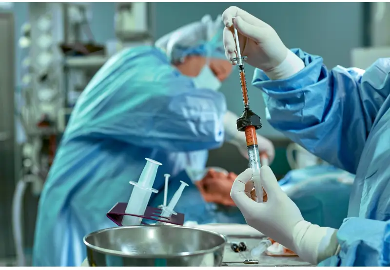 doctors work togeher on an operation