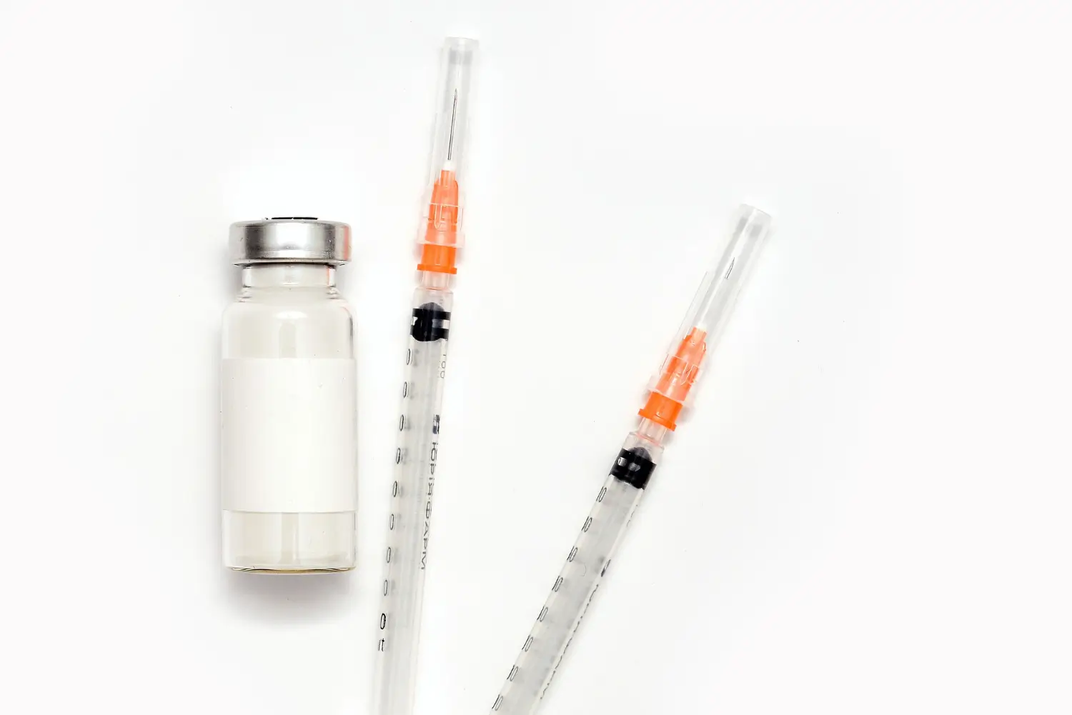 2 syringes and a vial
