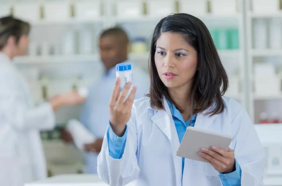 doctor checking the label for instructions