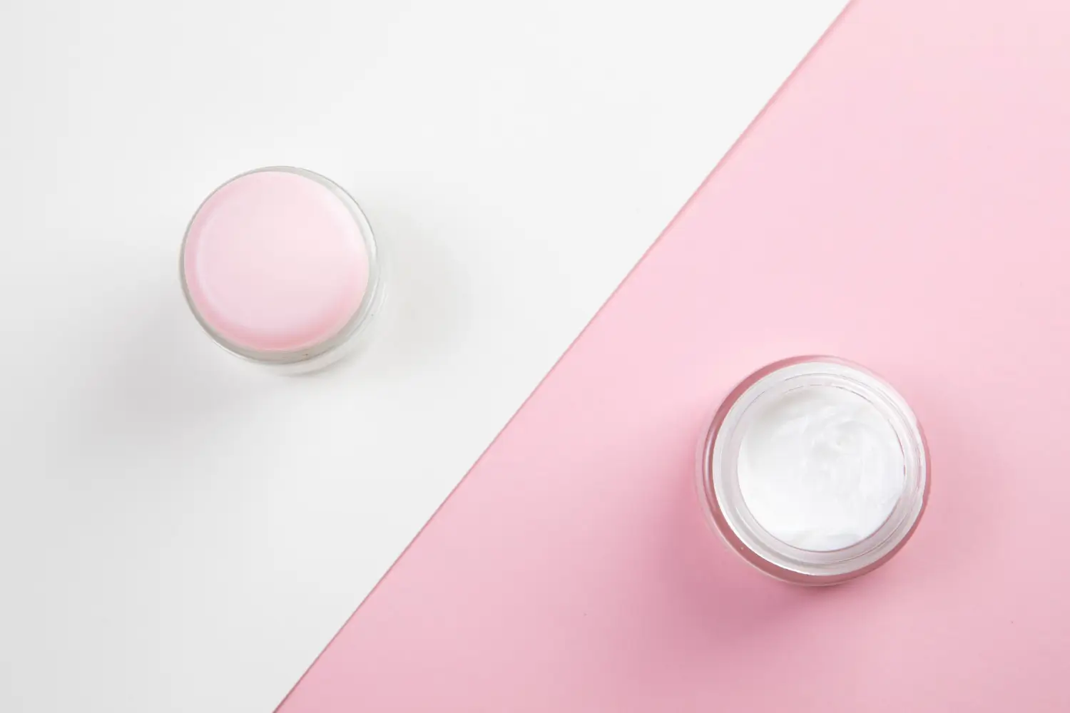 two creams with different color and use