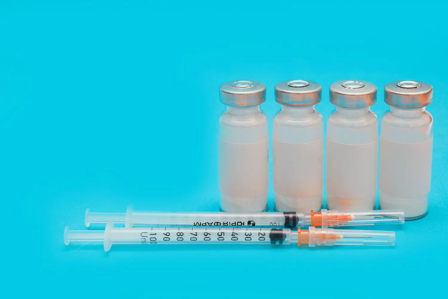 The doctor already prepared the syringes and vials for the injection