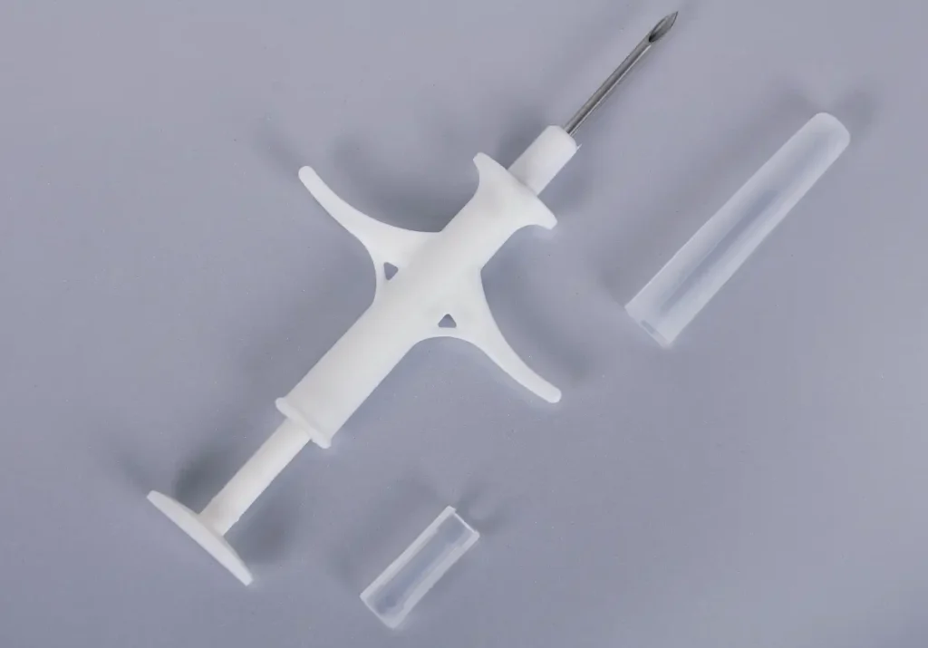 Cimzia prefilled injection device with needle and caps, designed for safe self-administration in autoimmune disease treatment.